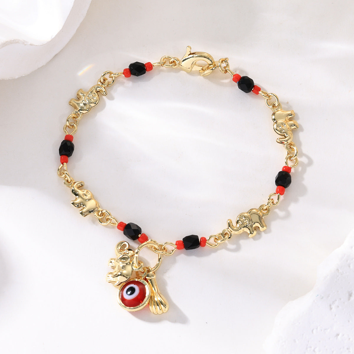 📿 Oferta ograniczona czasowo 50% zniżki 🌀 Bransoletka boho ze słonikiem na szczęście – symboliczne zawieszki, regulowany rozmiar, złocone wykończenie i 7 stylów ✨